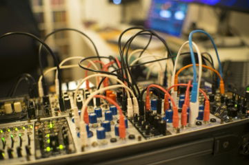 a close up of a control board with many wires